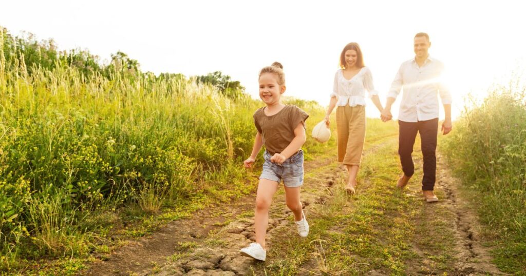 Family running in Field